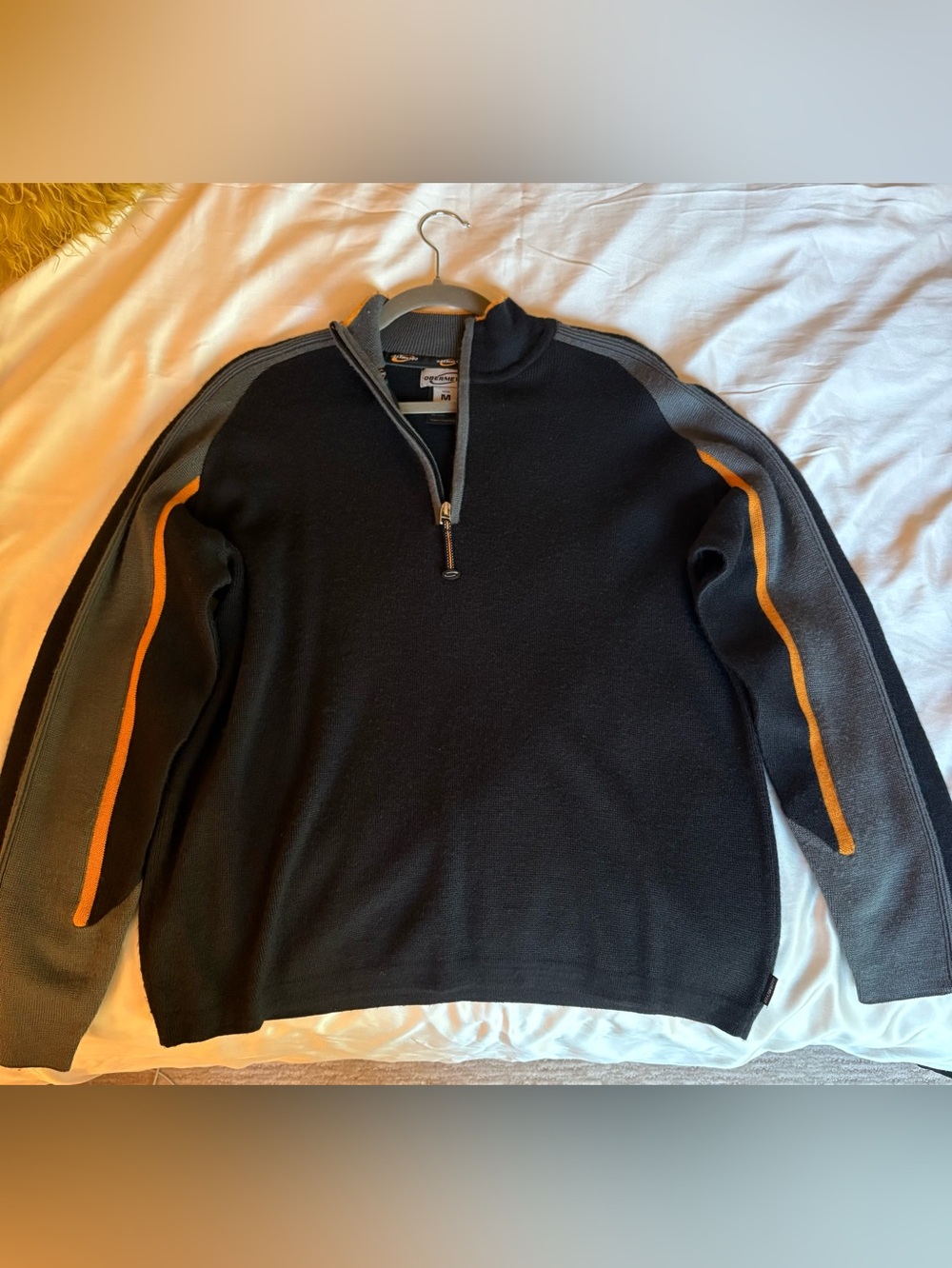 Obermeyer Men's Black Half-Zip Sweater with Gray Sleeves and Orange Stripe